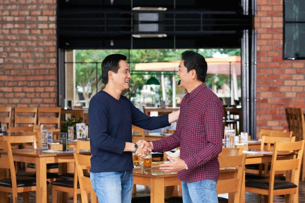 Male assistant in clothing store